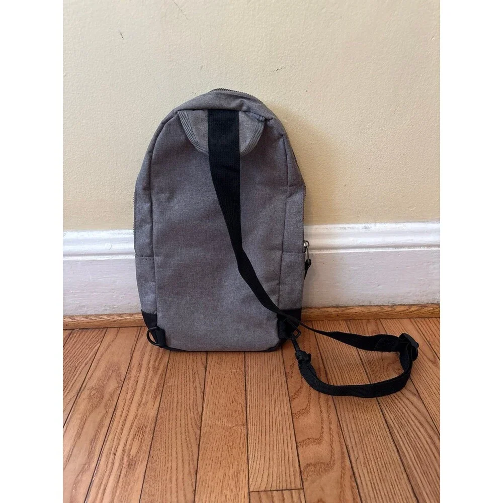 Backpack sling bag crossbody pockets gray black adjustable travel hiking teen
